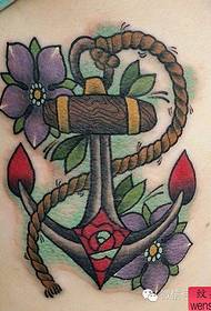 Treball de tatuatge d'ancoratge de color de l'abdomen