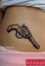 beauté abdomen beau motif de tatouage de pistolet