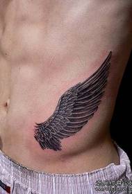 modello di tatuaggio addominale: un modello di tatuaggio ad ala di pancia
