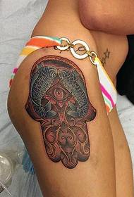 kvinnas sido höfter bläckfisk fatima hand tatuering bild