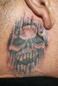 pob ntseg paus badskull tattoo qauv