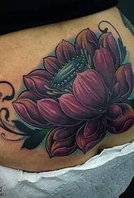 a lotus tattoo pattern on the hip