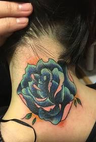 a rose flower tattoo on the girl's neck