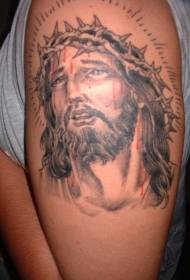 Jesus tattoo pattern with blood on the brown head on the shoulder