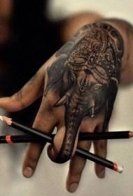 rokas muguras biedējošs melni pelēks ziloņa galvas tetovējums