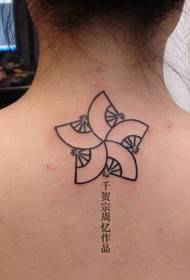 a very unique neck tattoo pattern