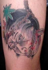 foto di tatuaggio di testa di guerriero giapponese morto di colore della gamba