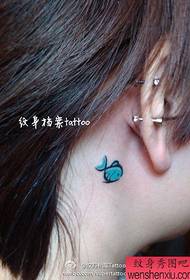 a cute little fish tattoo pattern for a girl's neck