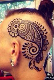 Inirerekomenda ng tattoo show bar ang isang head creative totem tattoo na gumagana