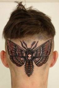 motivo tatuaggio farfalla e teschio color testa