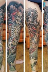 纹身腿部 男生腿部划船的骷髅纹身图片