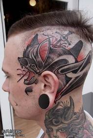 gyvūno tatuiruotė ant galvos