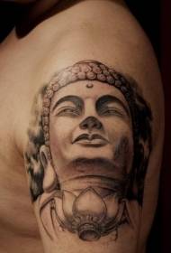Böyük real daş Budda başı və lotus döymə nümunəsi