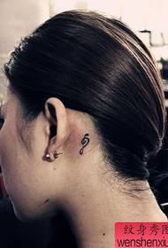 girl ear totem note tattoo pattern