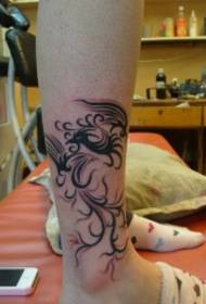 modello di tatuaggio totem fenice gamba ragazza