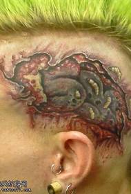 злостављање дјеце и привлачан узорак тетоважа главе