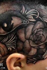 eye rose tattoo patroon on the head