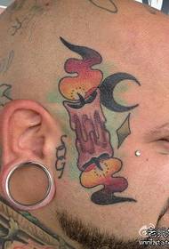 un modello alternativo di tatuaggio testa candela uomo