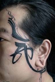 Nadomestni vzorec tetovaže besedila z glavo Totem