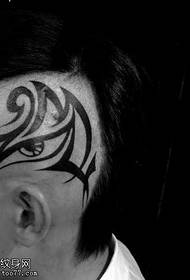 modello tatuaggio testa totem occhio realistico