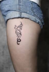 girls legs cat totem tattoo pattern