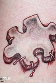 Bein Puzzle Tattoo Muster