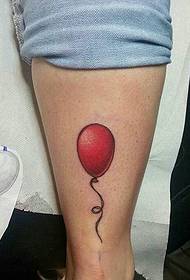un mudellu di tatuaggi di palluni rossi chì vola in l'aria
