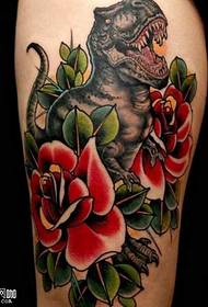 disegno del tatuaggio rosa dinosauro gamba