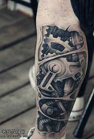 Kājas ir populārs skaists mehāniskās rokas tetovējums