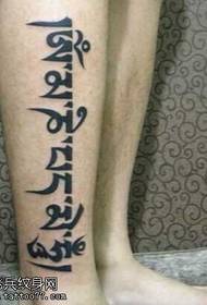 Pánské telecí tetování se šesti slovy mantry