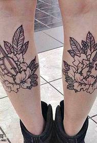 vzorec tatoo na nogah cvet kitare