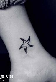 disegno del tatuaggio stella ruota ruota