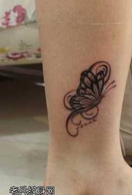 nogi mały tatuaż wzór motyla