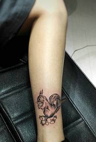 cute squirrel tattoo on the calf love pine cones