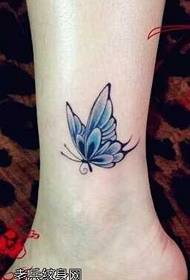 modello tatuaggio farfalla personalità gamba