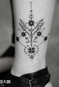 motif de tatouage jambe fleur totem