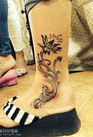 legna di fiori di gamba totem mudellu di tatuaggi