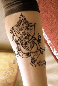 gamba come dio totem tatuaggio