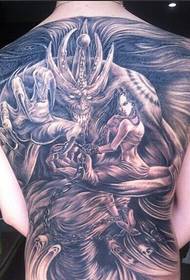 Ang klasikong lalaki ng buong likod ng itim at puting demonyo at paglalarawan ng tattoo sa kagandahan