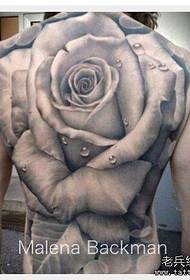 Buong likod na itim at puting rosas na tattoo
