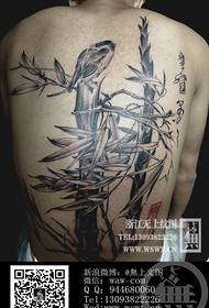 Tatuatge d'ocell de bambú a l'esquena