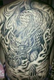Man's super handsome unicorn tattoo