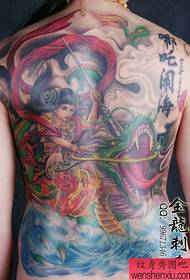 A popular and practical full back tattoo