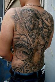 A well-loved full-backed public tattoo