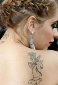 American Tattoo Stars Star Back Hands and Flowers Tattoo Pictures