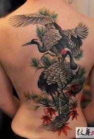 Exquisit patró de tatuatge de grua coronat amb esquena vermella