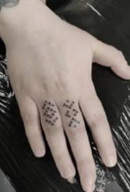 Art tattoos on 9 minimalist style fingers