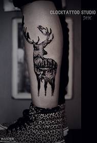 Cat and deer tattoo pattern on calf