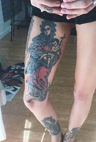 Tang Yun on the leg of the goddess holding the baby totem tattoo