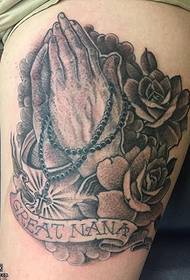 Thigh praying hands tattoo pattern